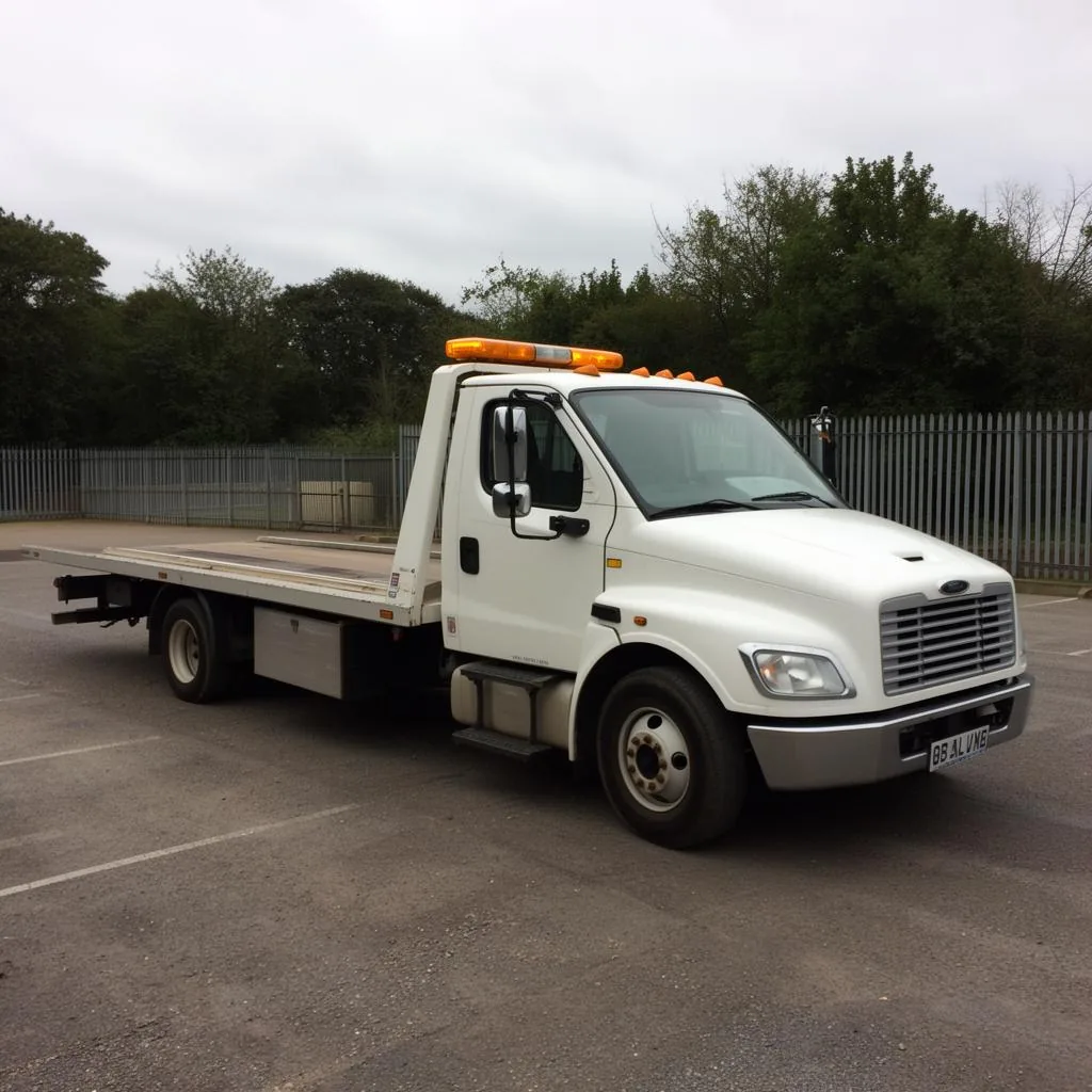 Richardson Tow Truck flatbed parked at the local DFW depot
